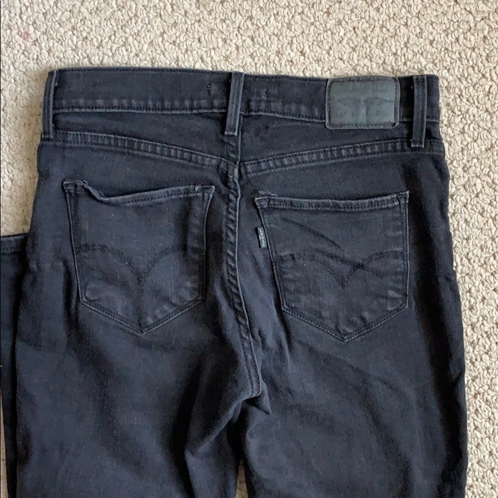 Faded black skinny 311 Levi’s
